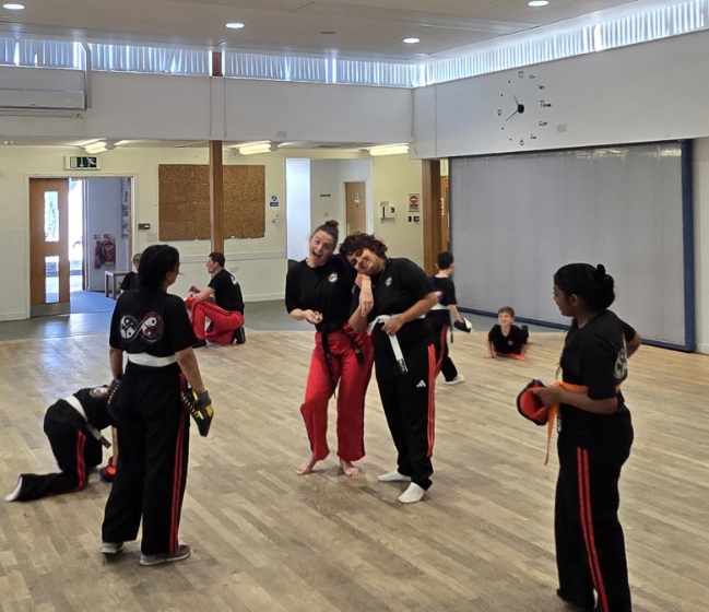 Students and instructor sharing a moment