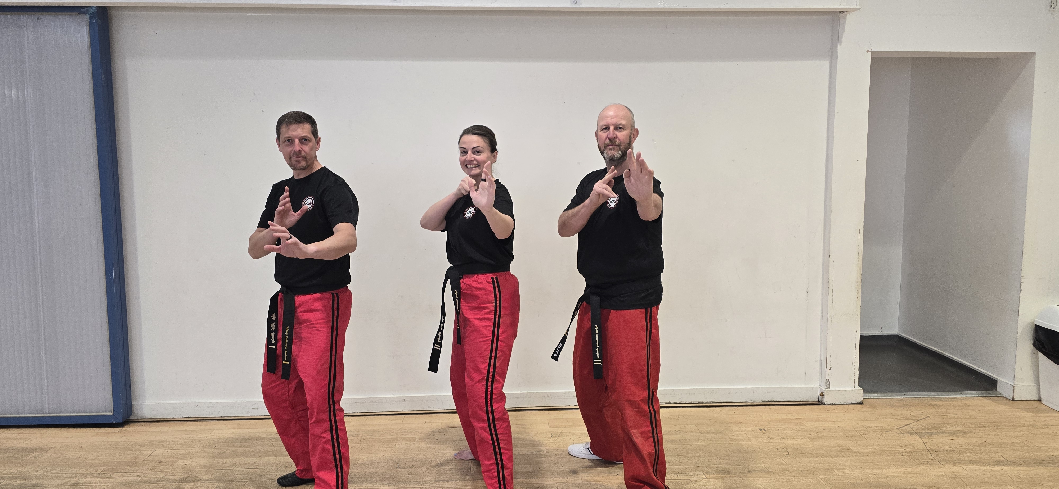 Instructors striking a playful pose