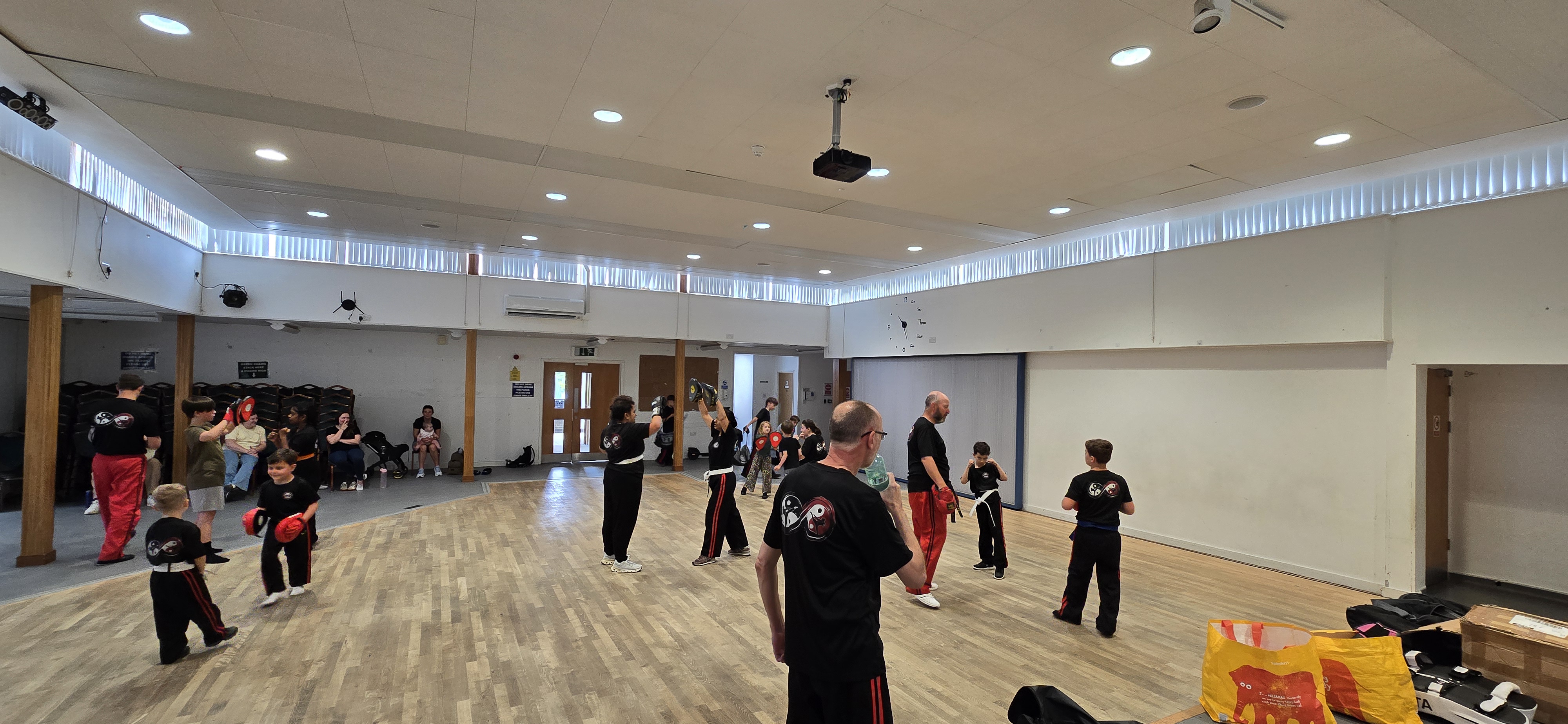 Students and instructors working pads