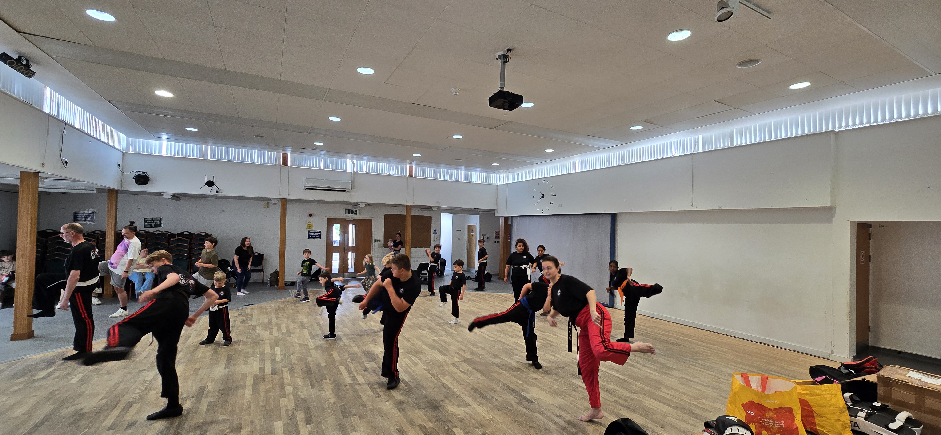 Group kicking drill in the main hall